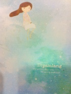 This note pad is tricky to read but it says.."Dreamlang. That girl over there looks like she's in Dreamland." I love that the LARGE print Dreamland is the one they totally chose to not spell check. PS not that i don't make spelling errors in what i publish but seriously people!!!