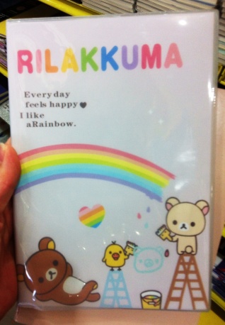 There seems to be a never ending supply of stupid notepad sayings. This one says "Rilakkuma. Everyday feels happy. I like a Rainbow."